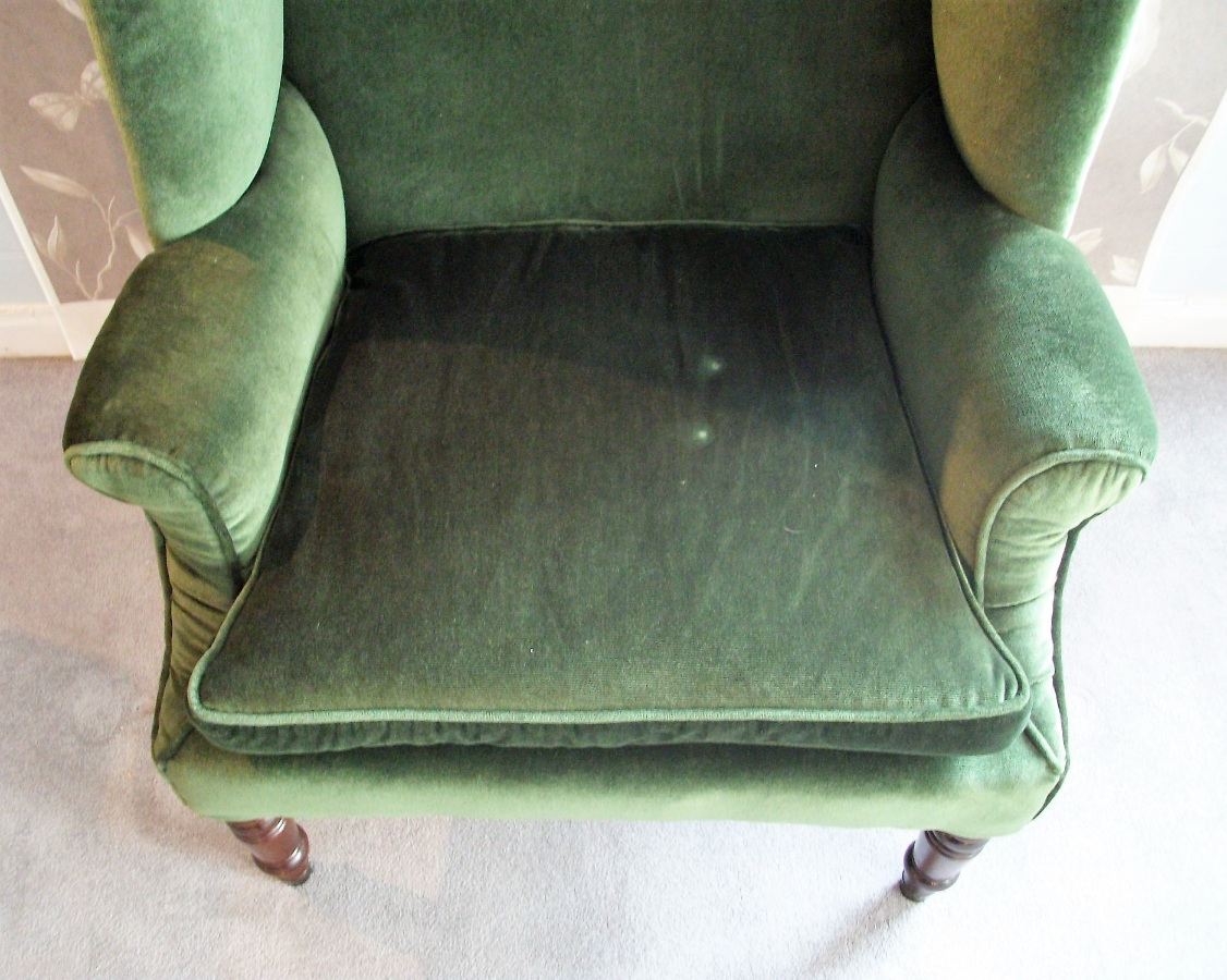 antique wing back armchair